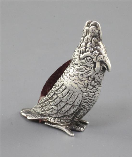 An Edwardian novelty silver pin cushion modelled as a cockatoo by Levi & Salaman, 2in.